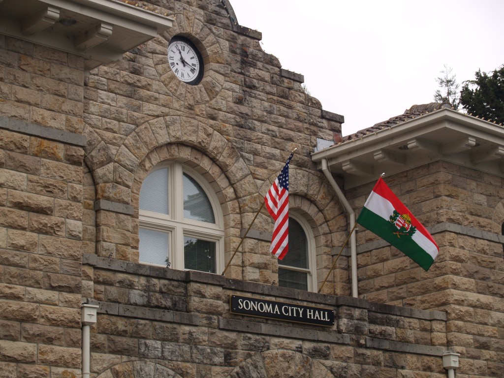 US and Hungarian flags on Sonoma's City Hall
