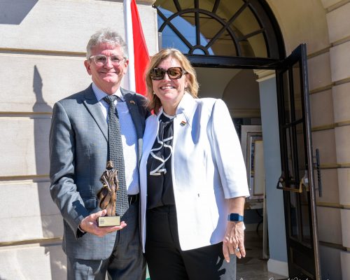Coalition President Andrea Lauer Rice Presenting John E. Parkerson, Honorary Counsul General of Hungary in Georgia with a Maquette of the Hungarian Freedom Fighter Photo credit: Bonnie Morét Photography/ Hungarian American Coalition