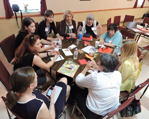 HATOG IX attendees participating in a workshop